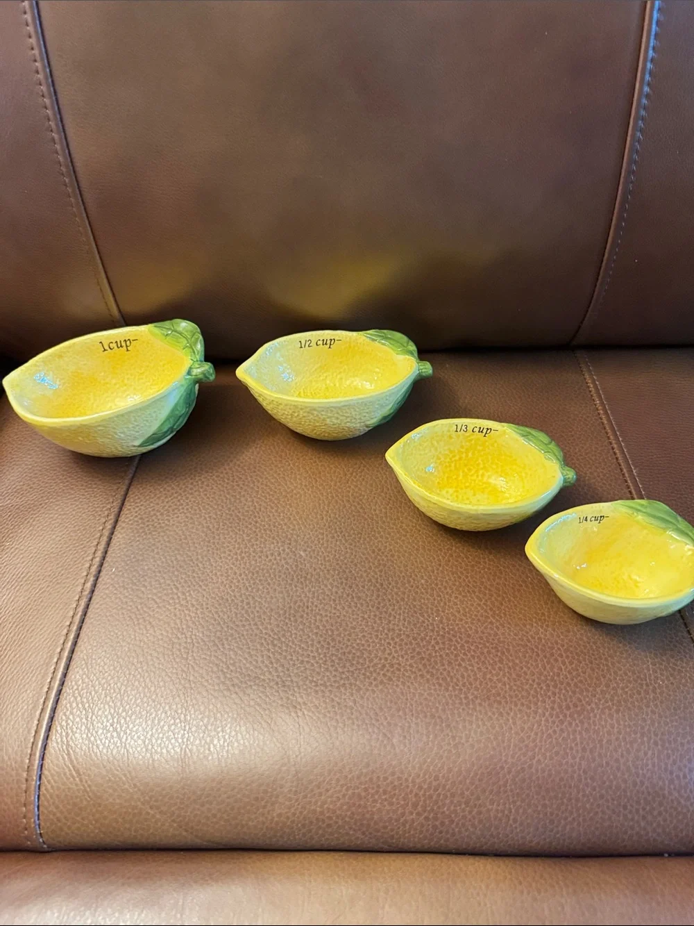 Lemon shaped nesting measuring cups